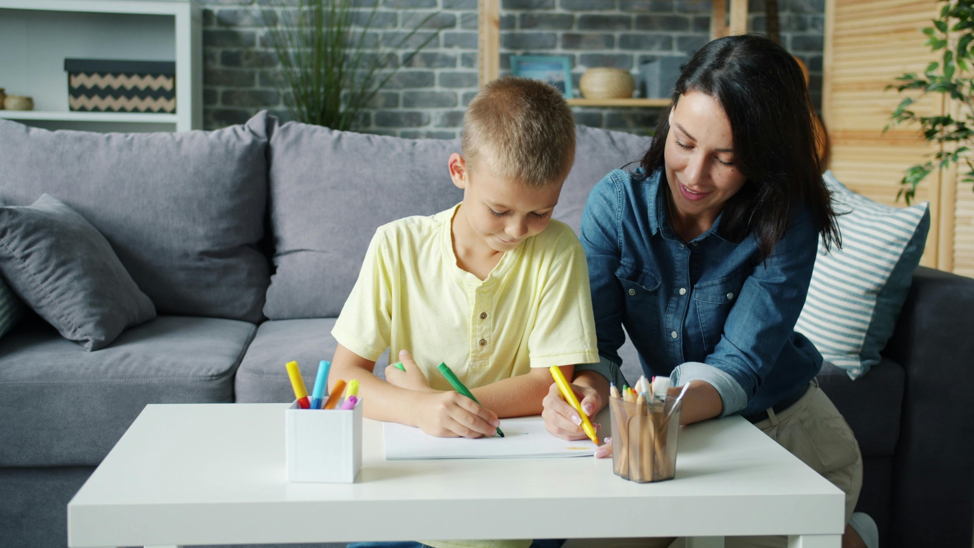 Parent helping child with studies